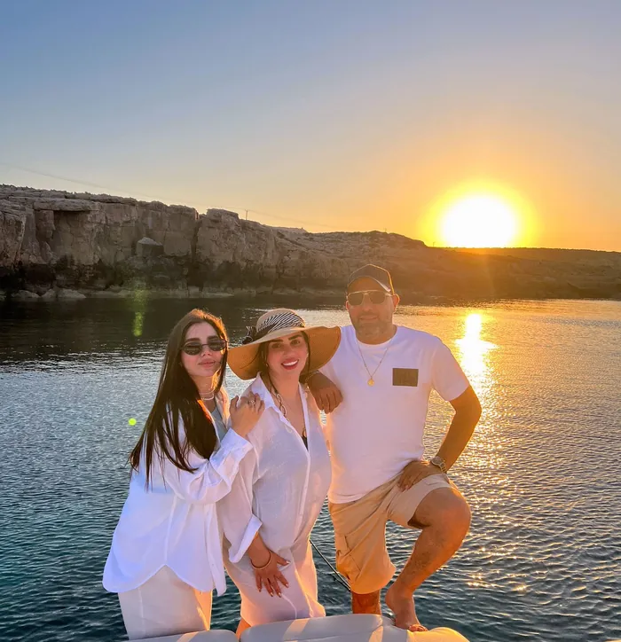 Friends at sunset on the bow