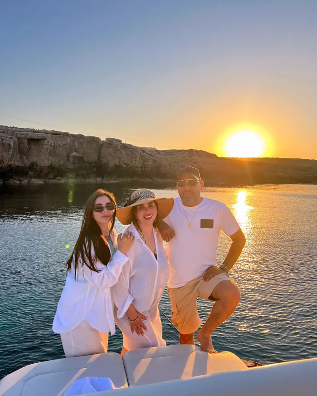 Friends at sunset on the bow