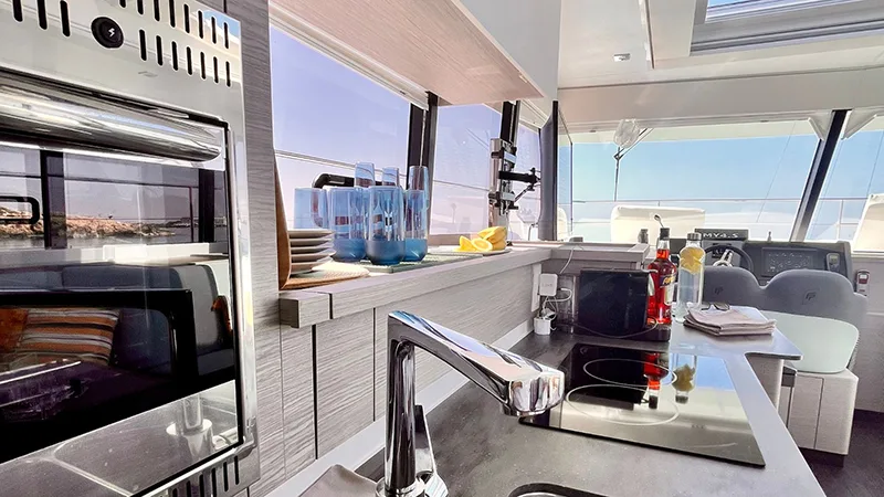 Galley and saloon inside the MY4.S catamaran